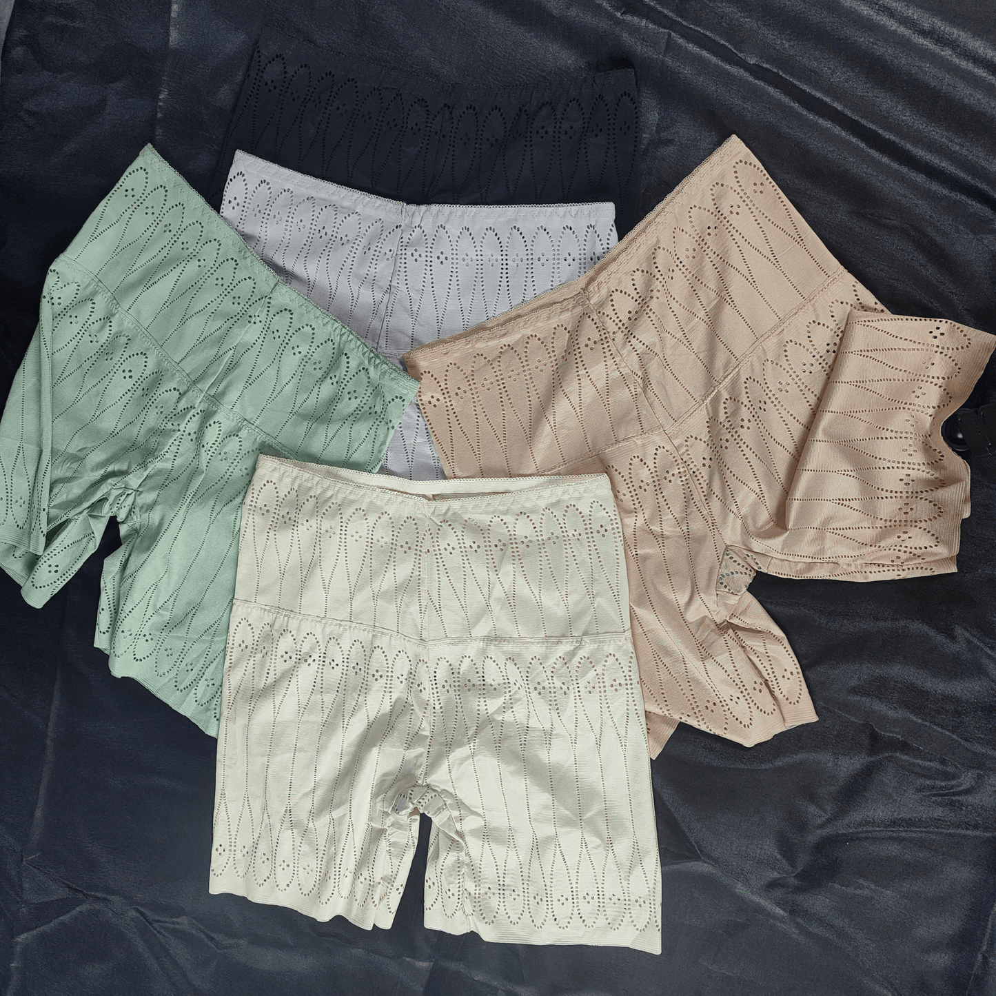 Pack of 3 AirLite Briefs Shorts in random colors featuring breathable fabric and delicate perforated designs.