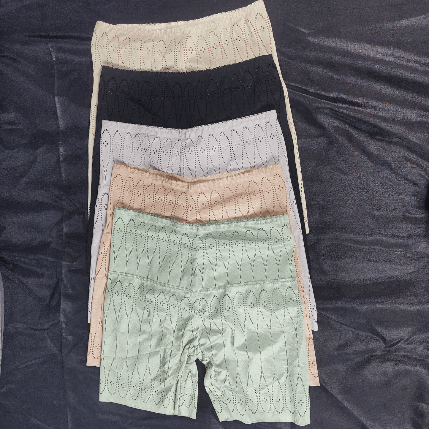 Pack of 3 AirLite Briefs Shorts in random colors, featuring soft breathable fabric and stylish perforated designs.